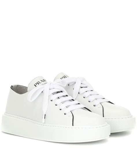 women white prada sneakers.